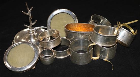 16 silver napkin rings, various, including two pairs, a ring tree, a pair of small photograph frames and two other items